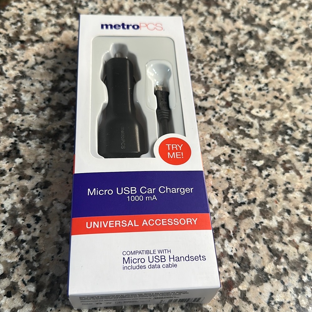 New METRO PCS Micro USB Car Charger. Compatible with USB Handsets.